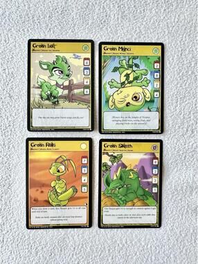 2003 Neopets TCG Green Bundle of 4 Trading Cards (Ixi Mynci Skeith Ruki)